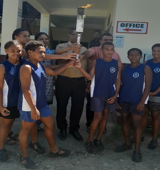 Arrival Coca cola games torch on the shores of Nadroga Arya College.